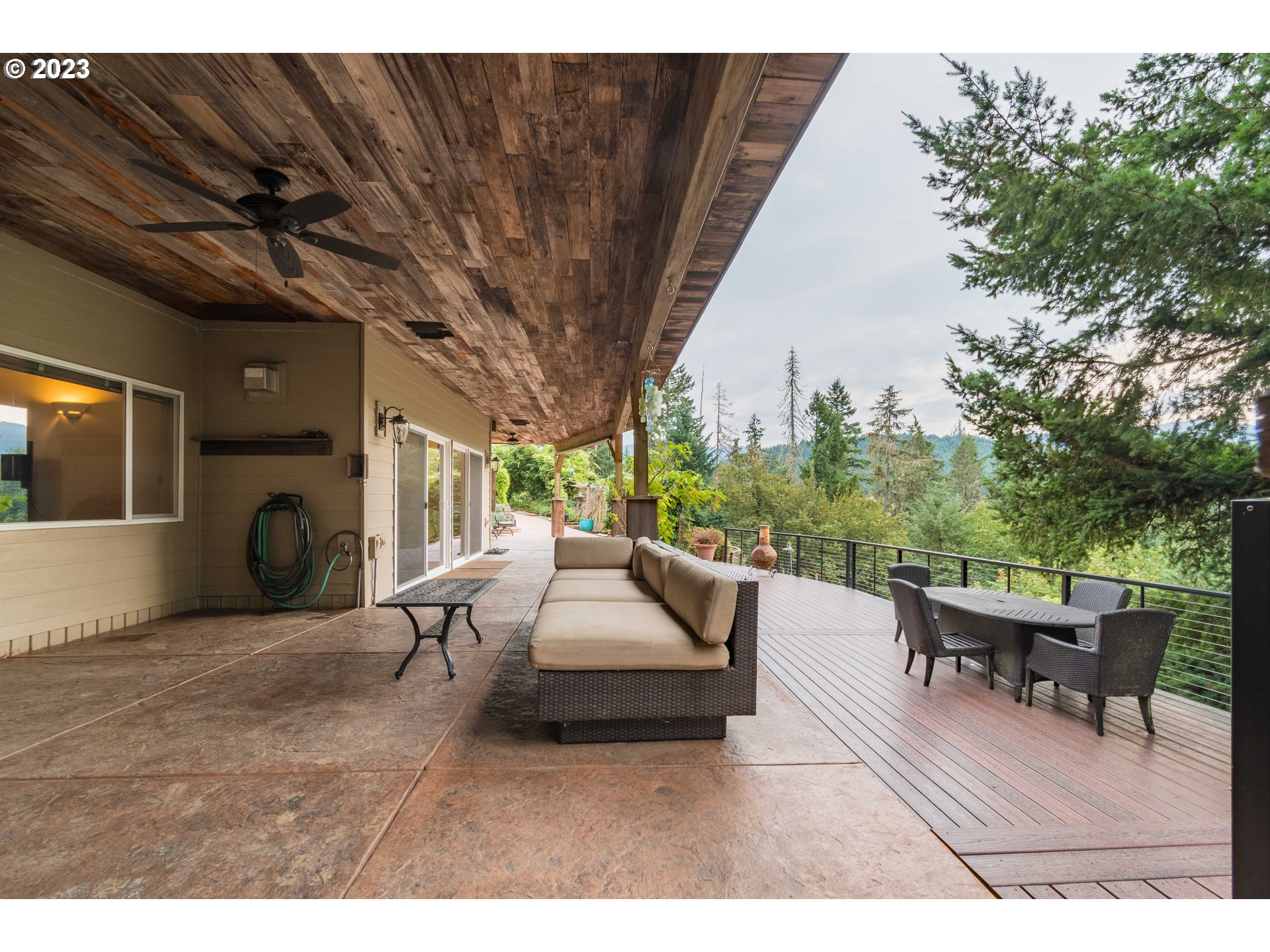 39350 Eagles Rest Road Dexter, OR 97431 - Photo 34 of 42 a living room with furniture and a fireplace