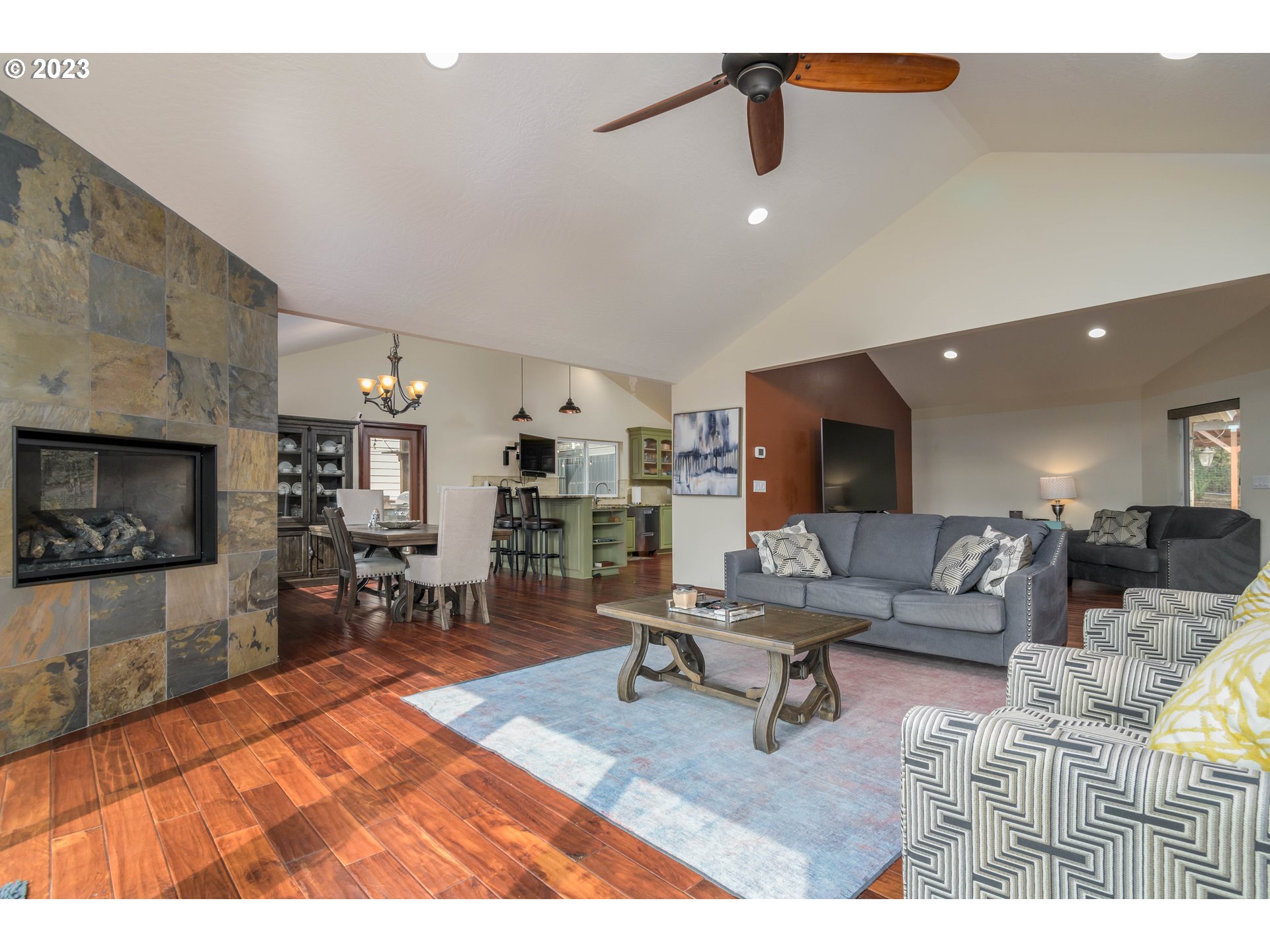 39350 Eagles Rest Road Dexter, OR 97431 - Photo 4 of 42 a living room with furniture and a fireplace