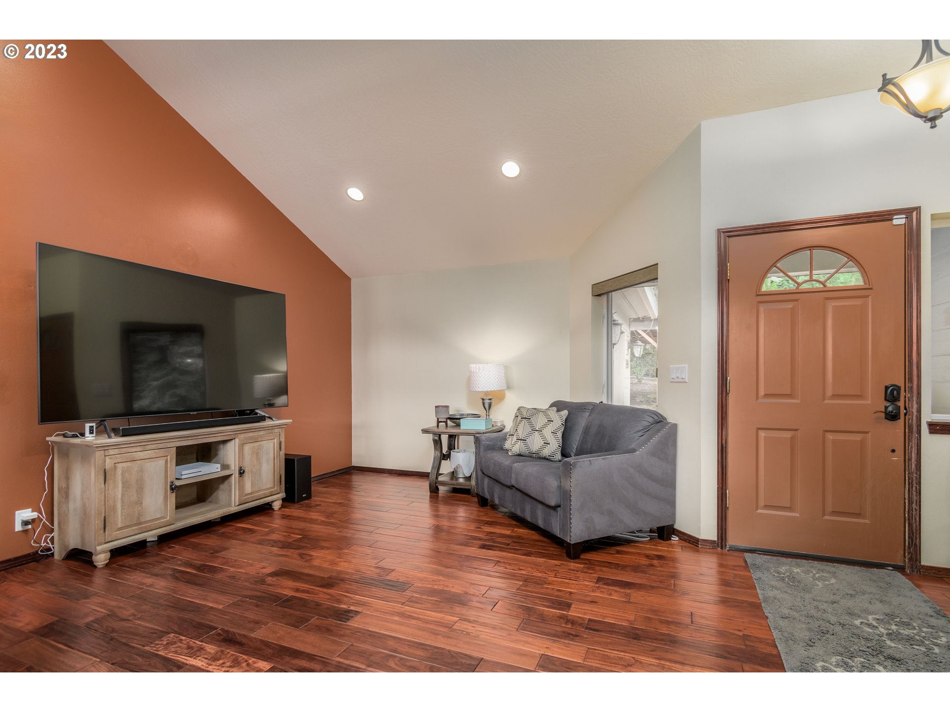 39350 Eagles Rest Road Dexter, OR 97431 - Photo 6 of 42 a living room with furniture and a flat screen tv