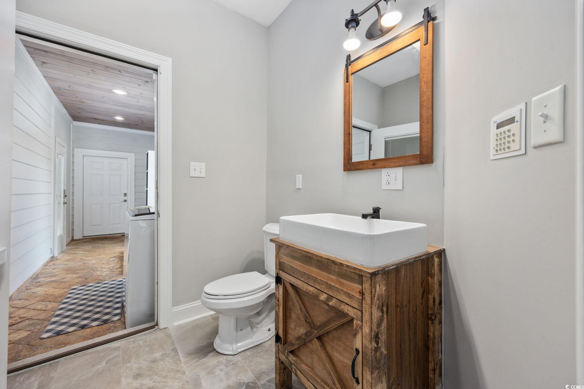 11569 Bay Drive Little River, SC 29566 - Photo 25 of 40 Bathroom with vanity and recessed lighting
