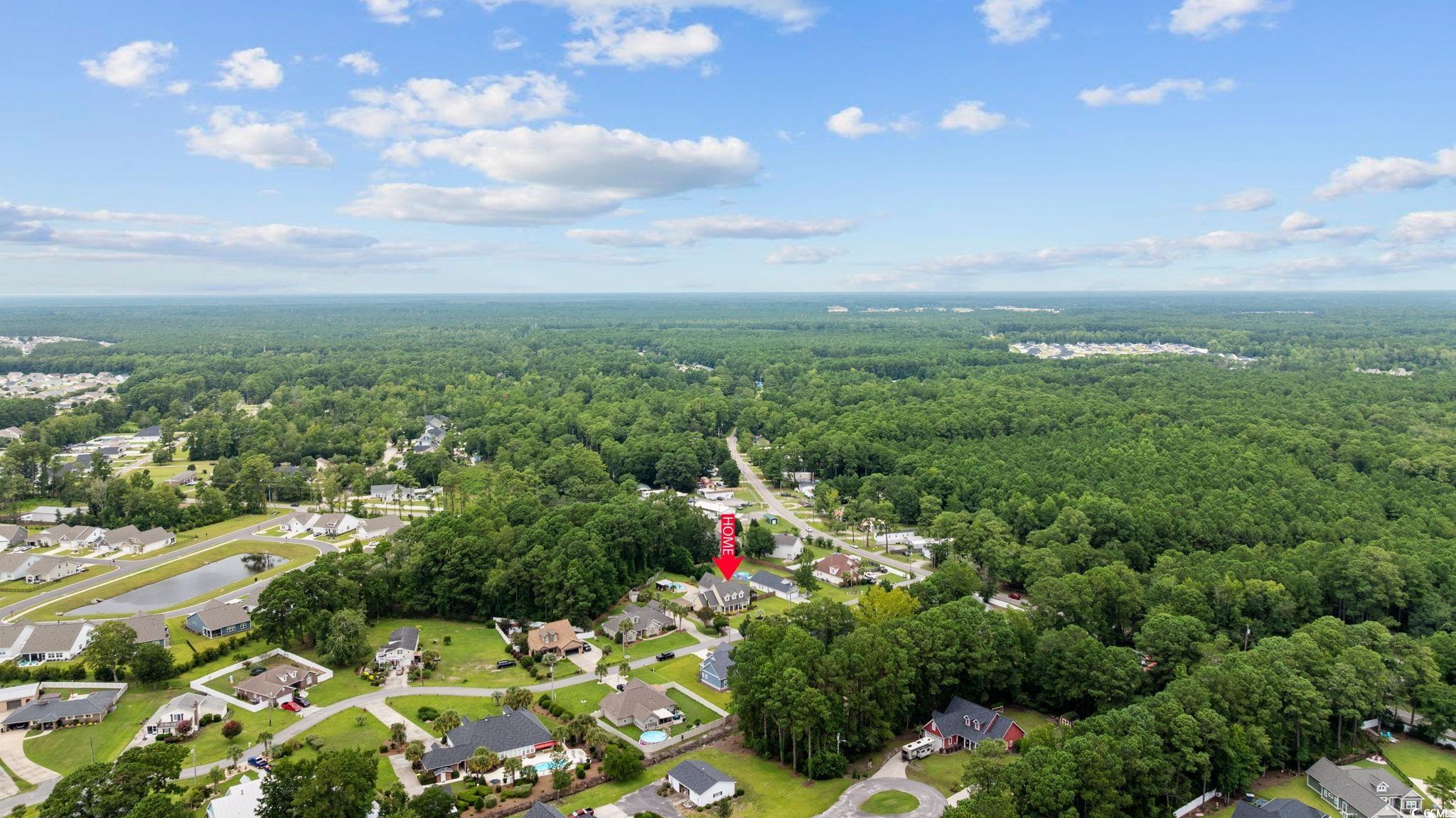 11569 Bay Drive Little River, SC 29566 - Photo 40 of 40 Aerial view of property's location featuring a forest and nearby suburban area