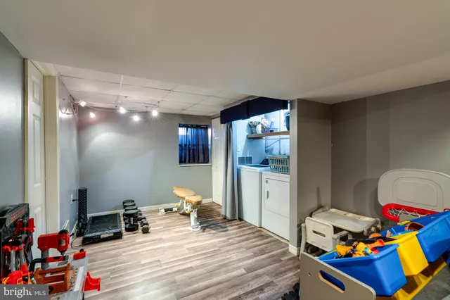 a stove top oven sitting inside of a kitchen