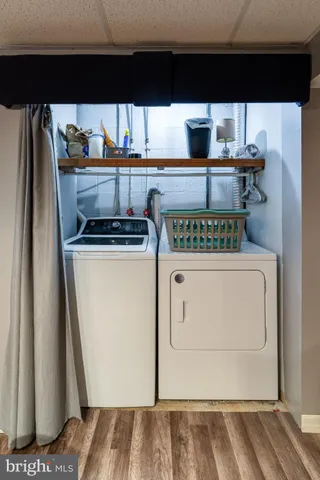 a view of a deck with a table and chair swing