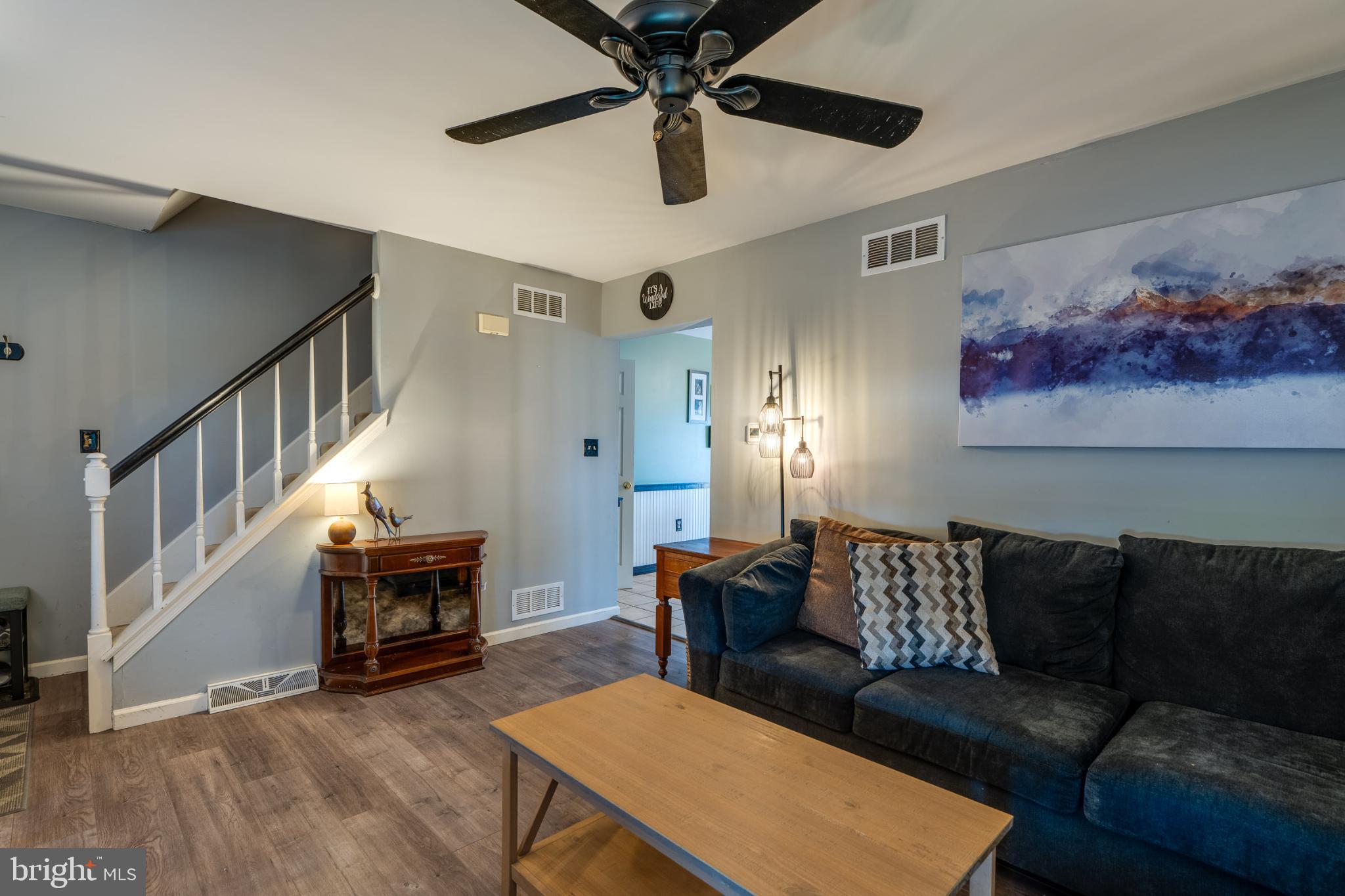 7 Brookfield Road Lititz, PA 17543 - Photo 3 of 28 a living room with furniture and a fireplace