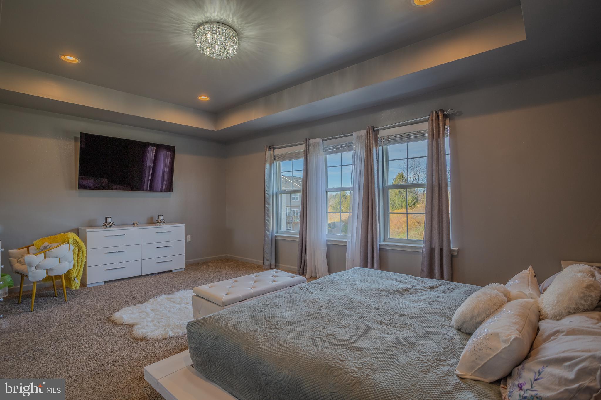 35 Landis Court Falling Waters, WV 25419 - Photo 25 of 64 a bedroom with furniture and a flat screen tv