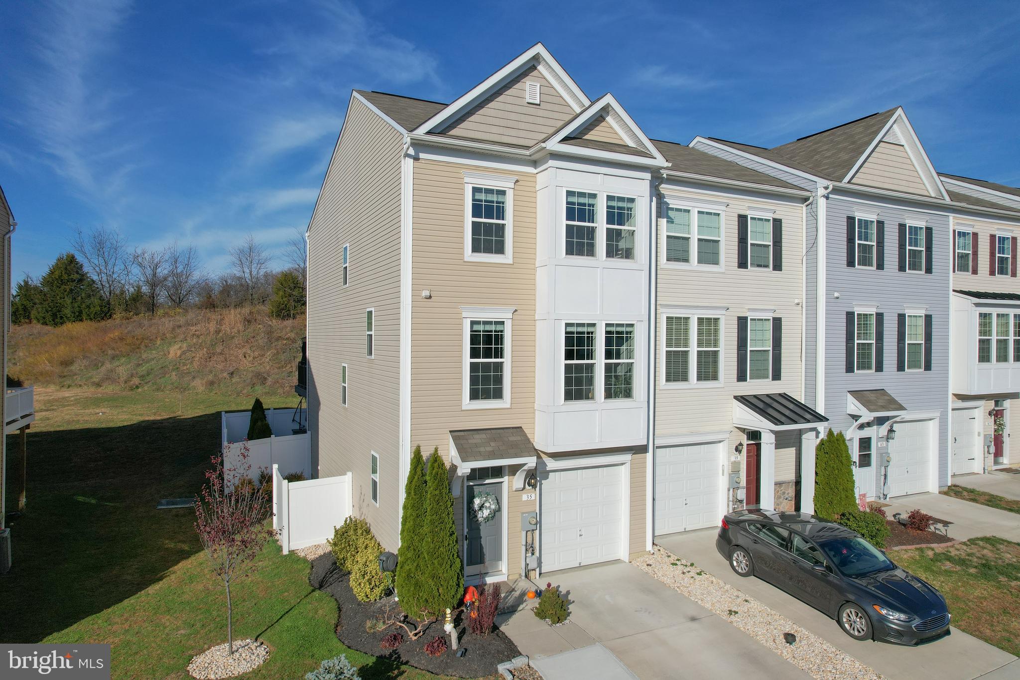 35 Landis Court Falling Waters, WV 25419 - Photo 4 of 64 a front view of a house with a yard
