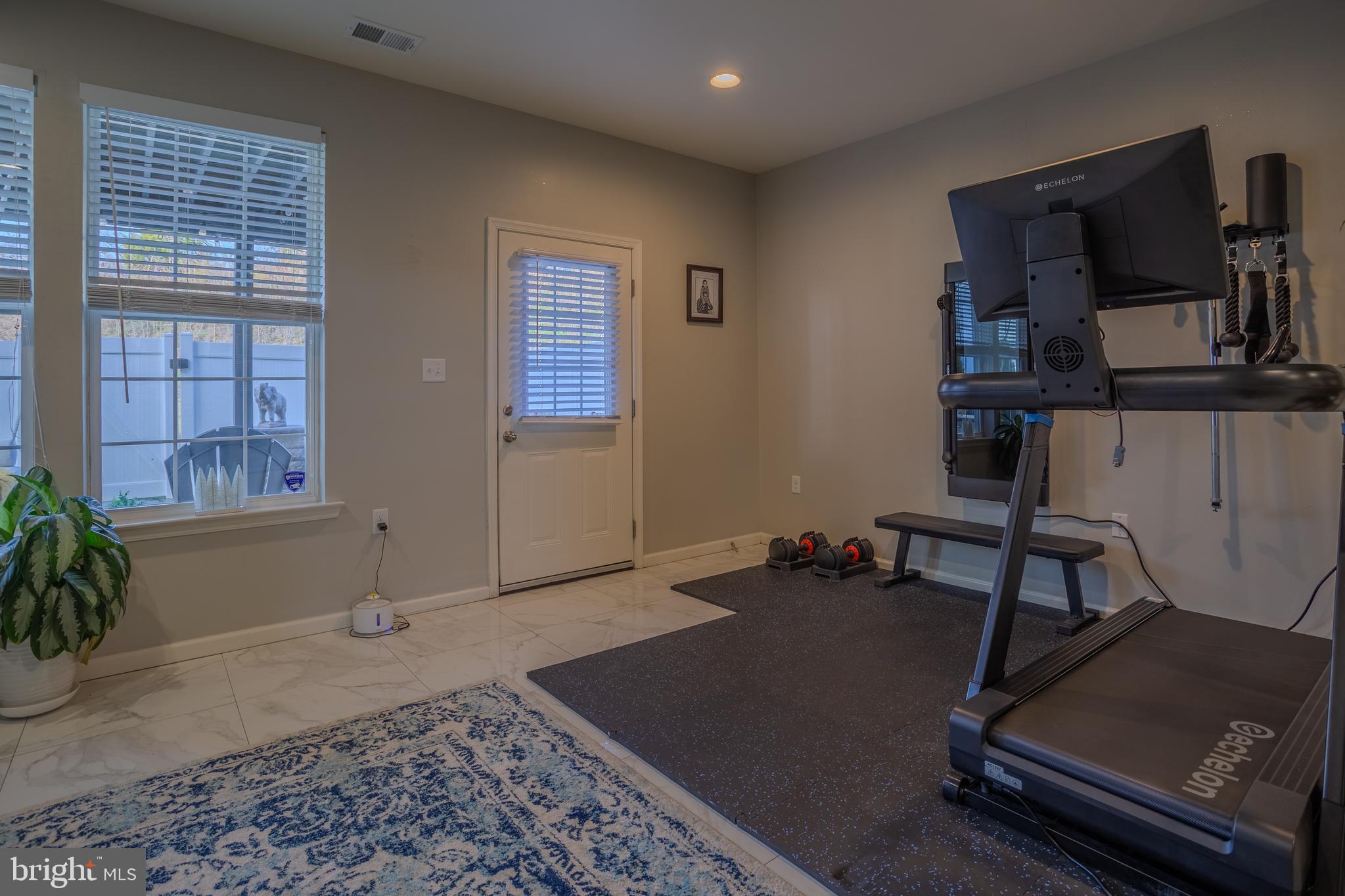 35 Landis Court Falling Waters, WV 25419 - Photo 50 of 64 a room with furniture and flat screen tv