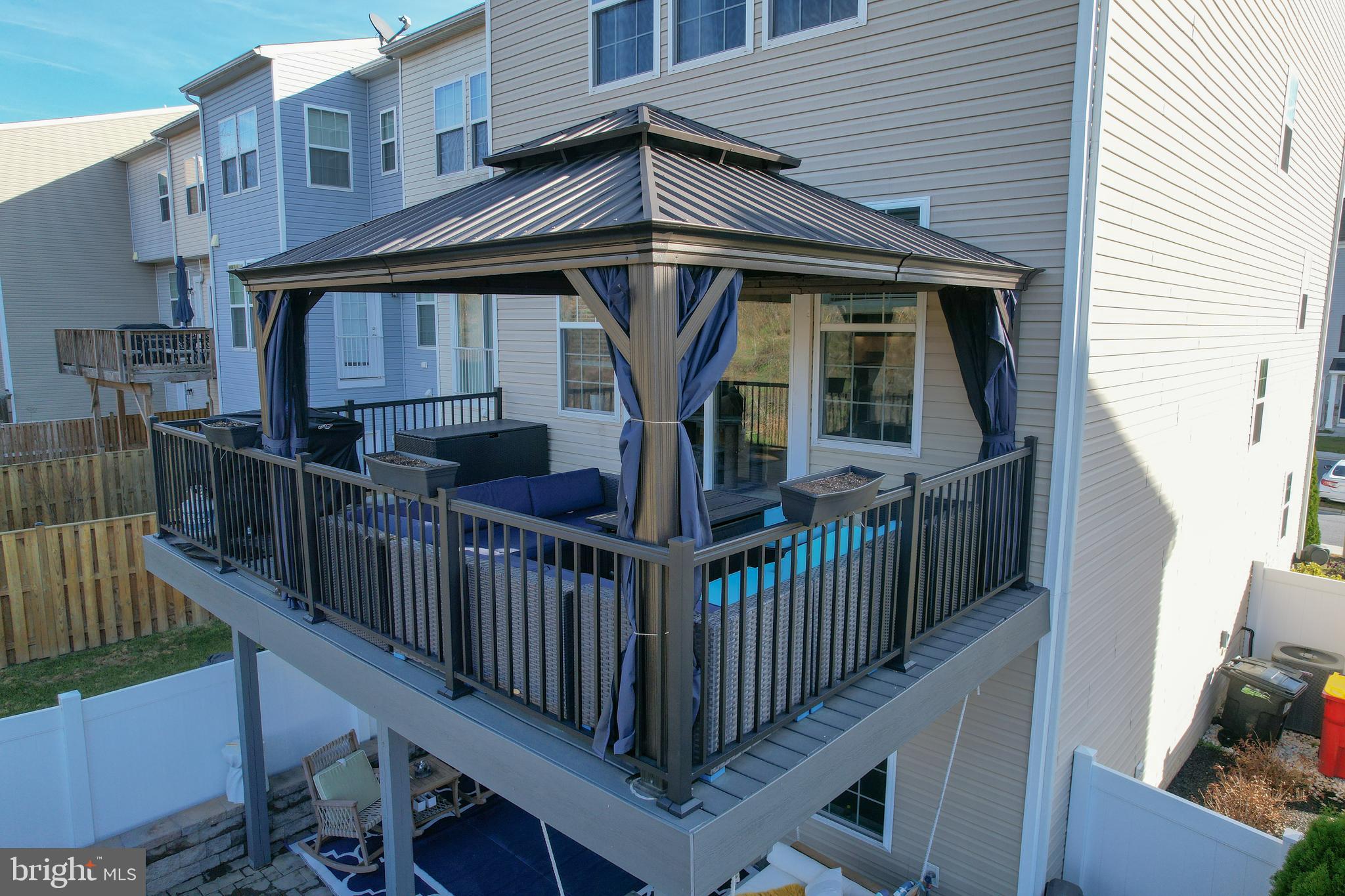 35 Landis Court Falling Waters, WV 25419 - Photo 56 of 64 Upper Deck with covered gazebo and privacy panels