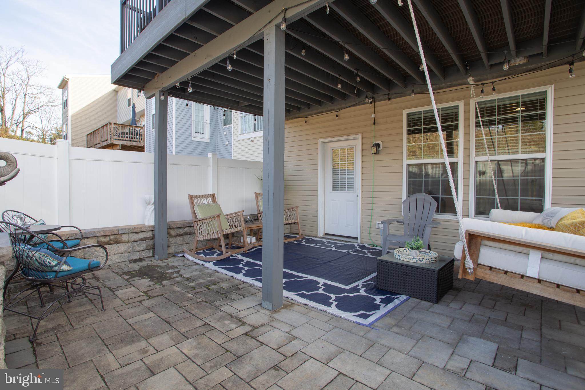 35 Landis Court Falling Waters, WV 25419 - Photo 61 of 64 a outdoor space with the couches and dining table chair