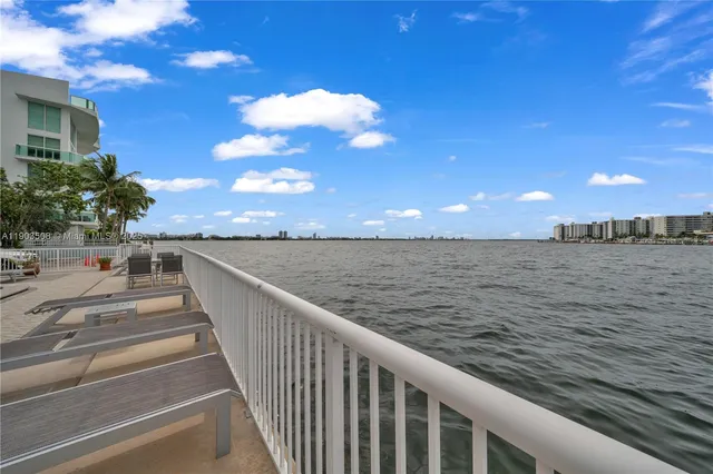 a view of a balcony with an ocean view