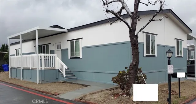 a house with trees in front of it