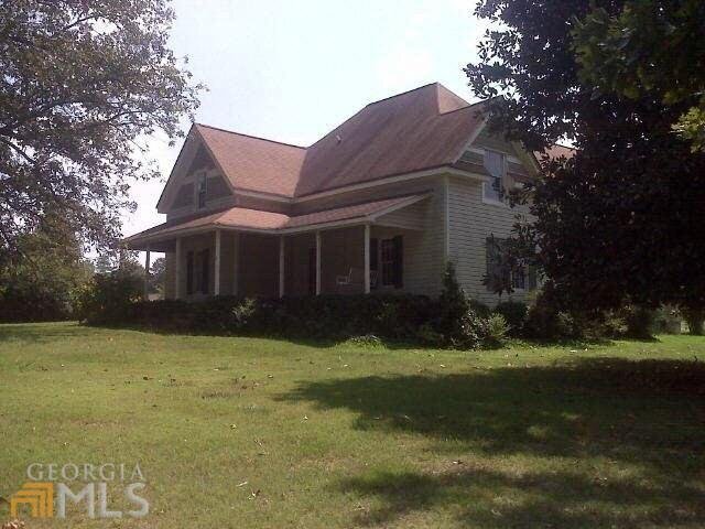 4999 Bentley Road, Unit A Monroe, GA 30656 - Photo 1 of 1 a front view of a house with a yard