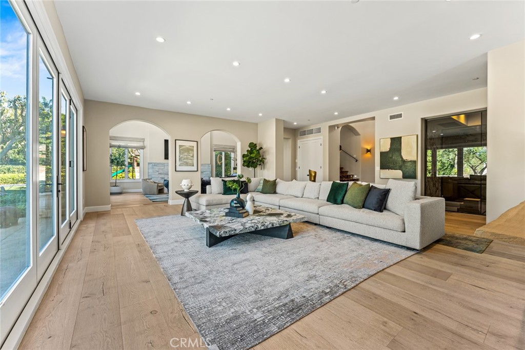 11765 Riehl Avenue Tustin, CA 92782 - Photo 17 of 53 a living room with furniture and a large window