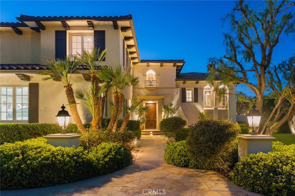 11765 Riehl Avenue Tustin, CA 92782 - Photo 2 of 53 a view of a building with a yard