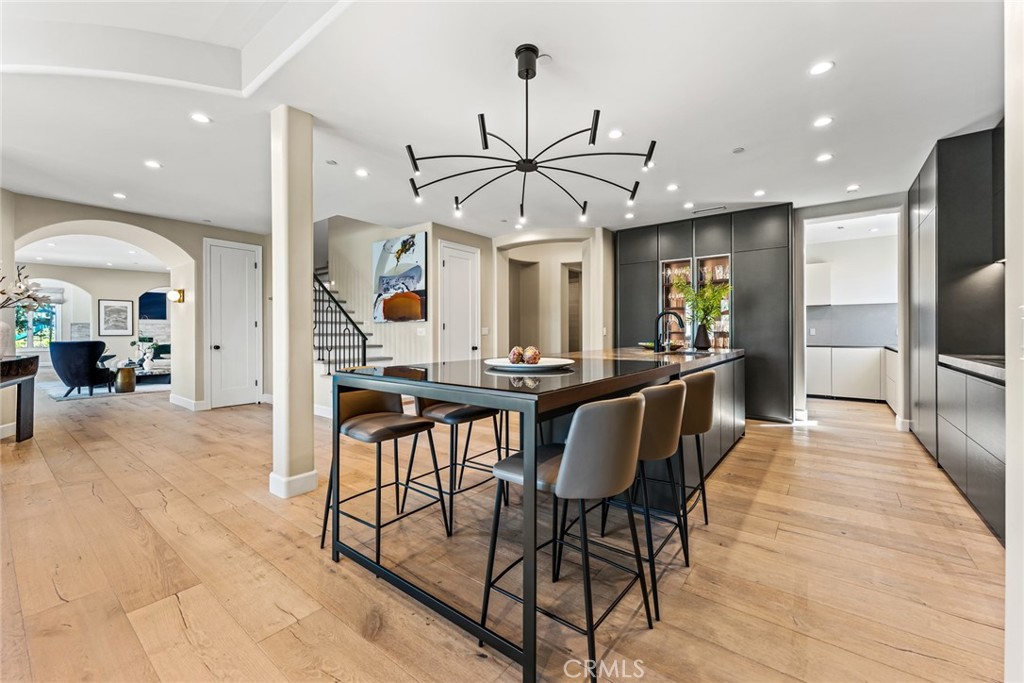 11765 Riehl Avenue Tustin, CA 92782 - Photo 23 of 53 a view of a dining room with furniture window and wooden floor