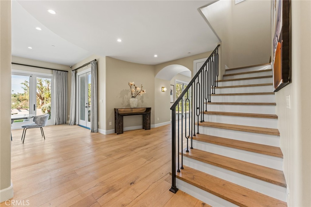 11765 Riehl Avenue Tustin, CA 92782 - Photo 32 of 53 a view of an entryway with wooden floor and door