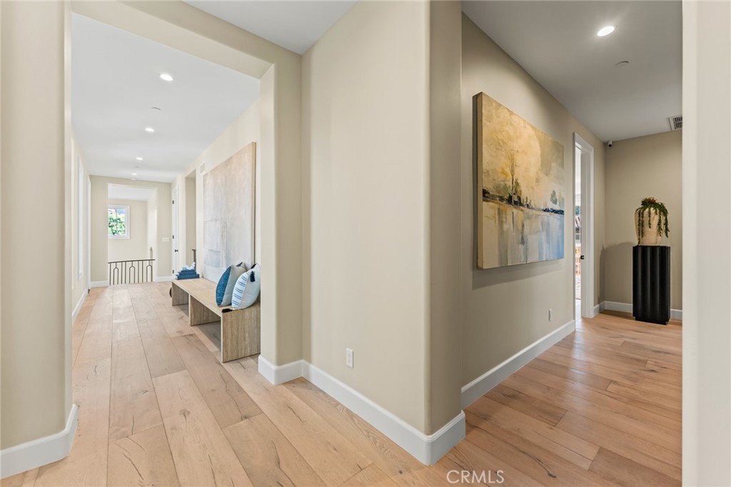 11765 Riehl Avenue Tustin, CA 92782 - Photo 35 of 53 a view of a hallway and a livingroom with a furniture