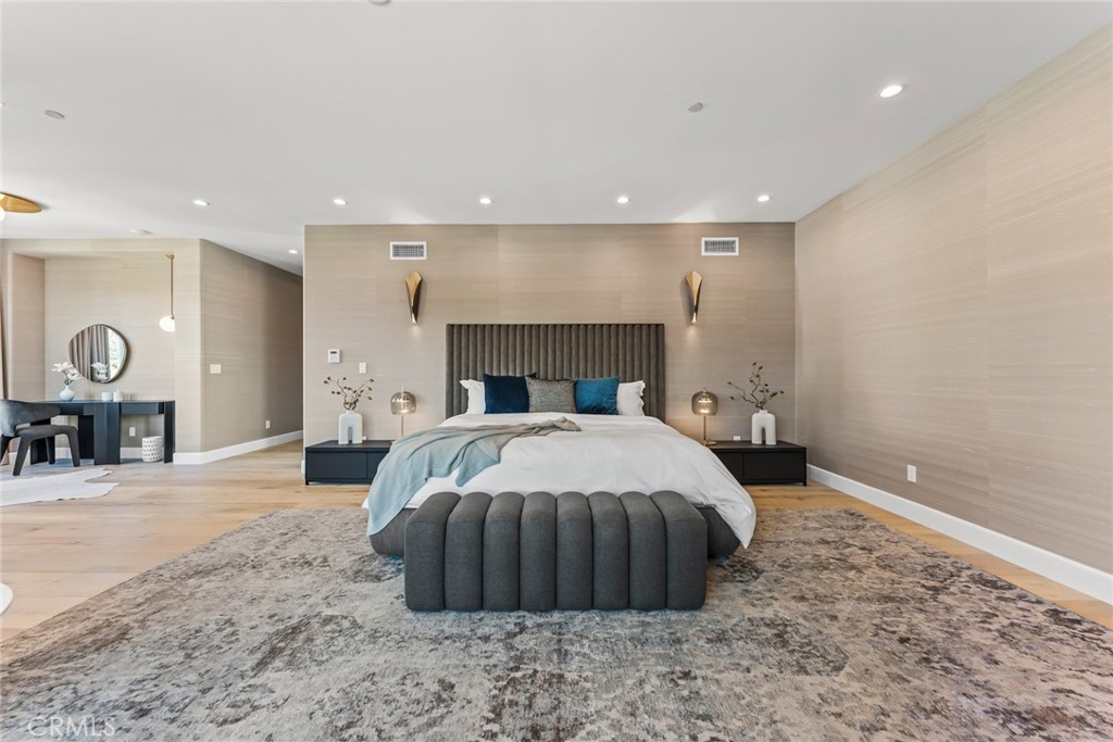 11765 Riehl Avenue Tustin, CA 92782 - Photo 36 of 53 a bedroom with a bed and a table