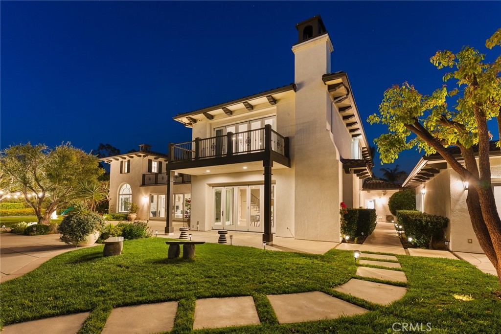 11765 Riehl Avenue Tustin, CA 92782 - Photo 5 of 53 a front view of a house with a yard