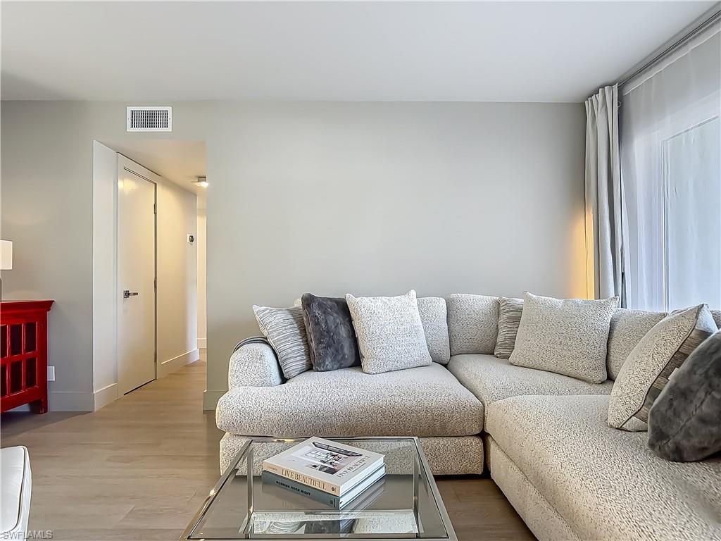 2544 First Street, Unit 102 Fort Myers, FL 33901 - Photo 2 of 19 a living room with furniture and a couch