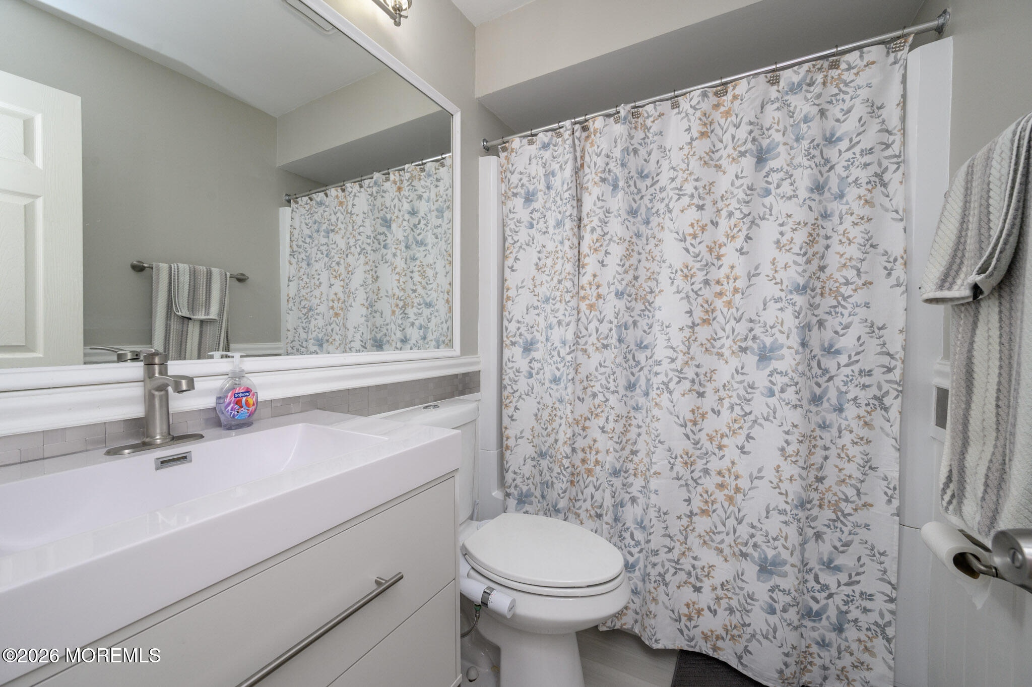 17 Inwood Terrace Freehold, NJ 07728 - Photo 17 of 22 a bathroom with a sink toilet and shower