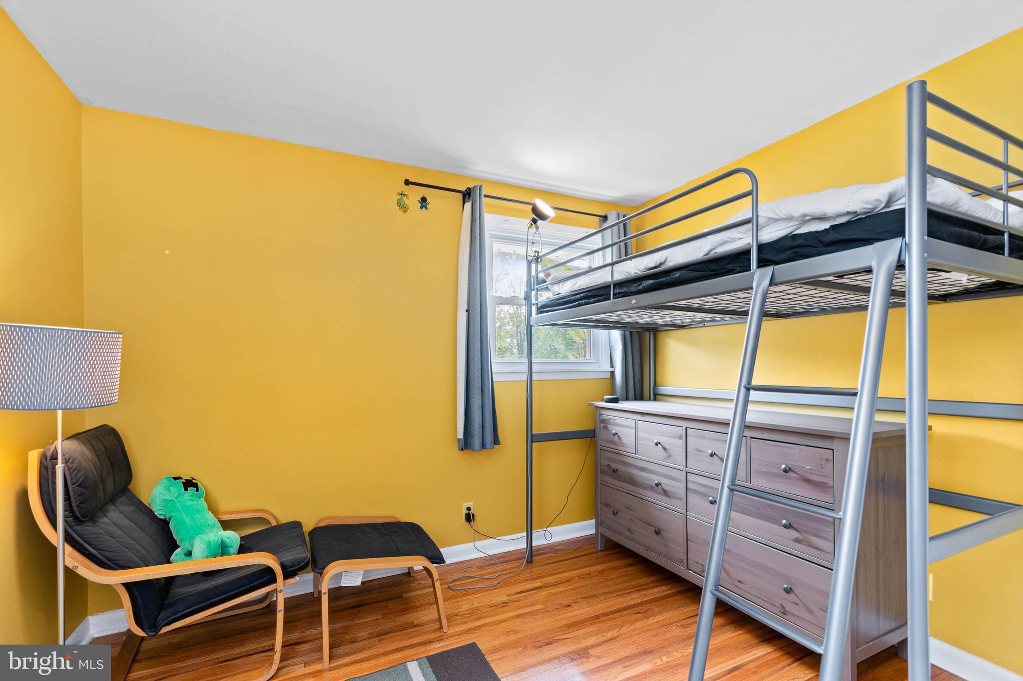 3 Surrey Road Voorhees, NJ 08043 - Photo 24 of 28 a bedroom with a bed and wooden floor