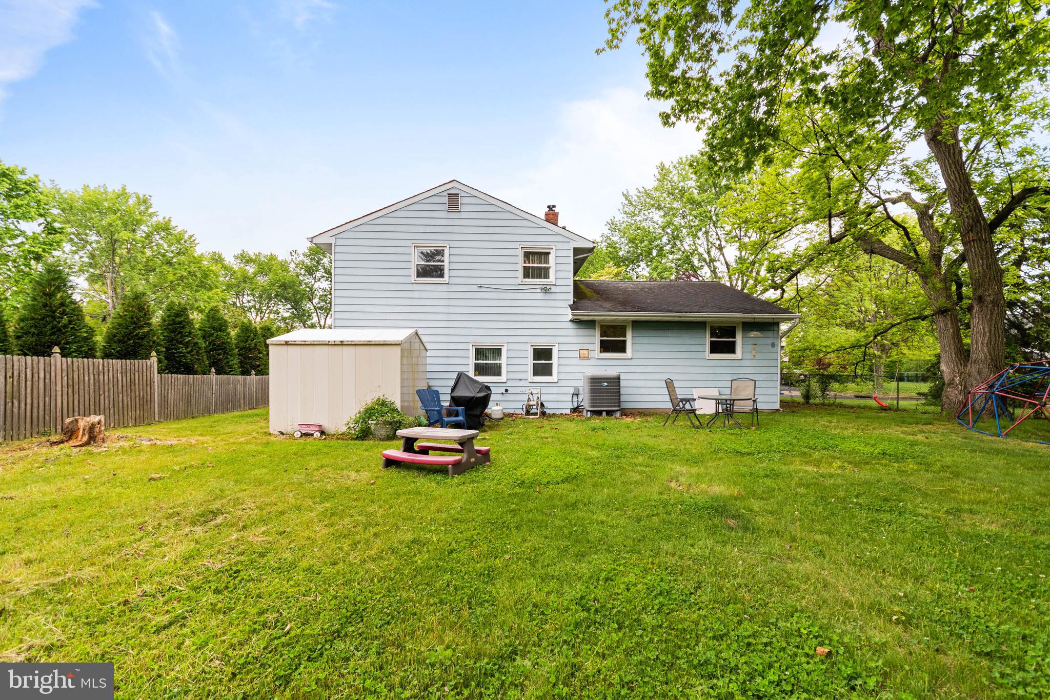 3 Surrey Road Voorhees, NJ 08043 - Photo 28 of 28 a view of a house with a yard and sitting area
