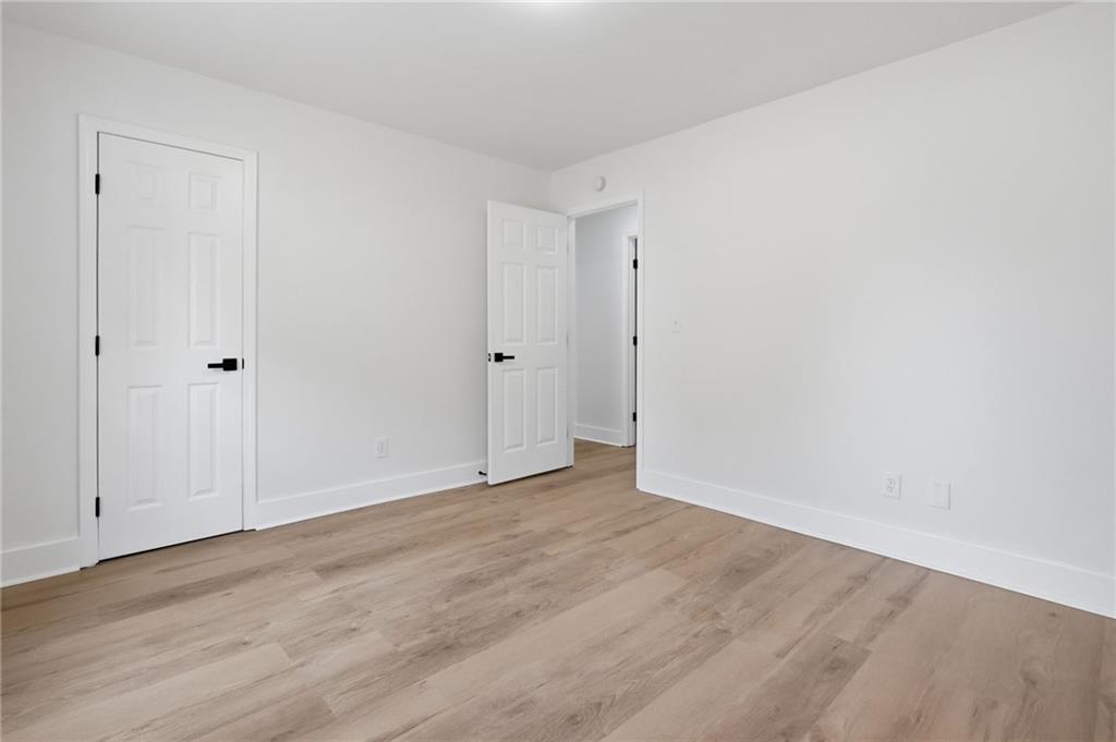 1808 Singer Way Lithonia, GA 30058 - Photo 22 of 37 a view of an empty room