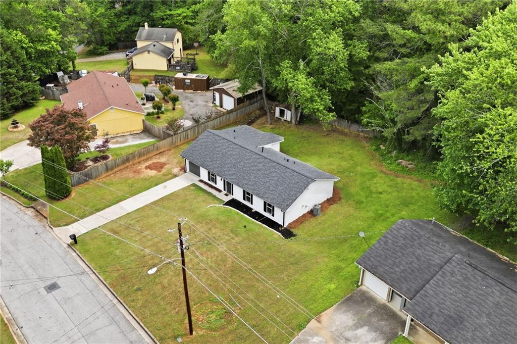 1808 Singer Way Lithonia, GA 30058 - Photo 33 of 37 a view of a house with pool