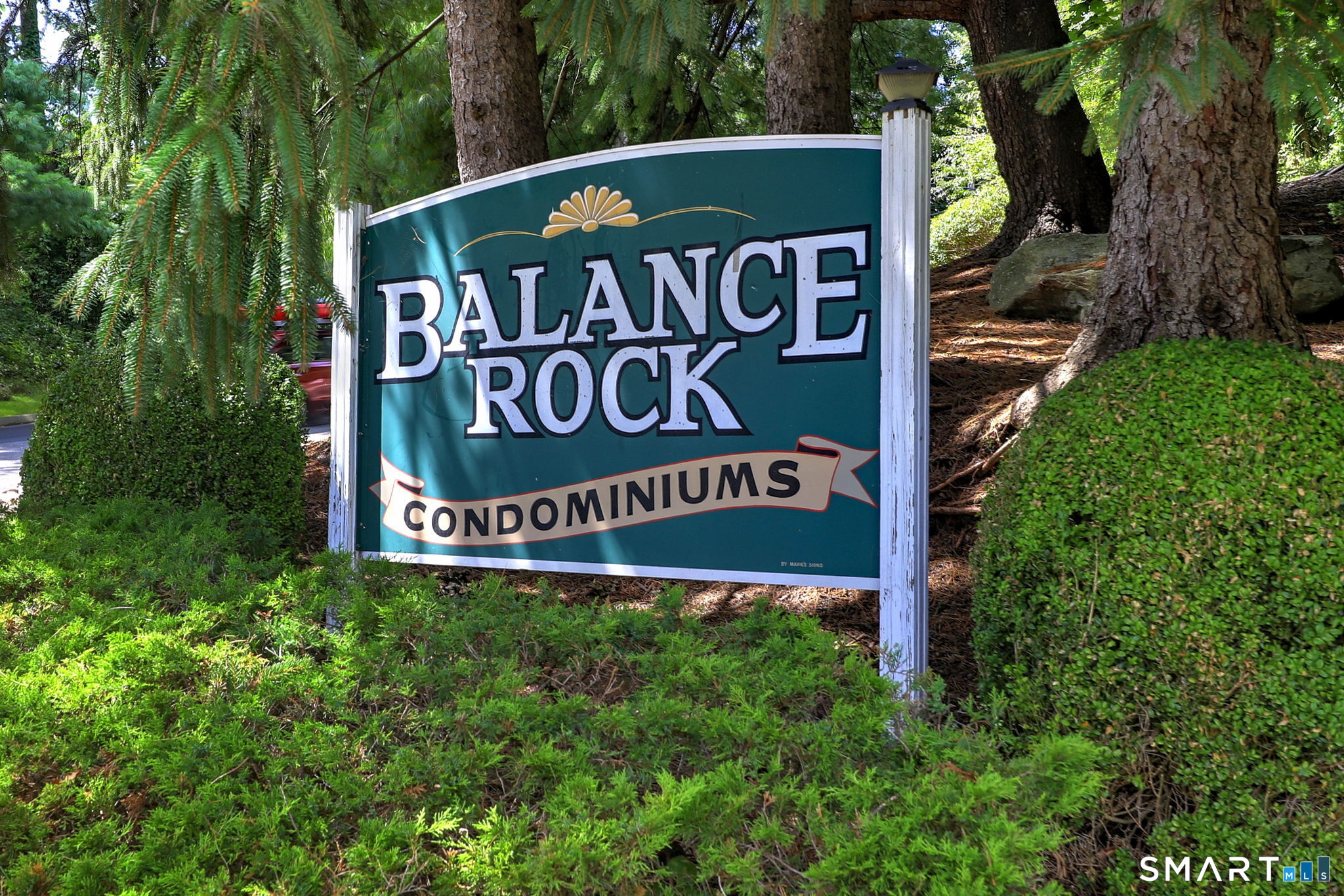 43 Balance Rock Road, Unit 11 Seymour, CT 06483 - Photo 1 of 40 a sign that is on a pole