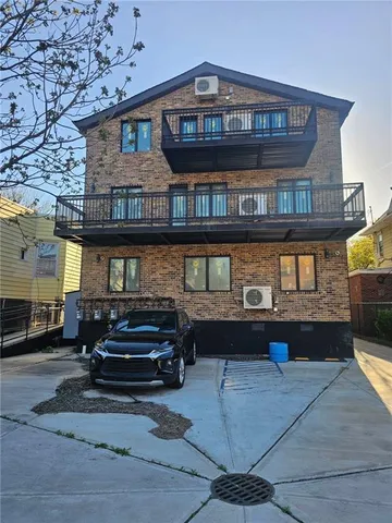 a room with granite countertop chairs and fireplace