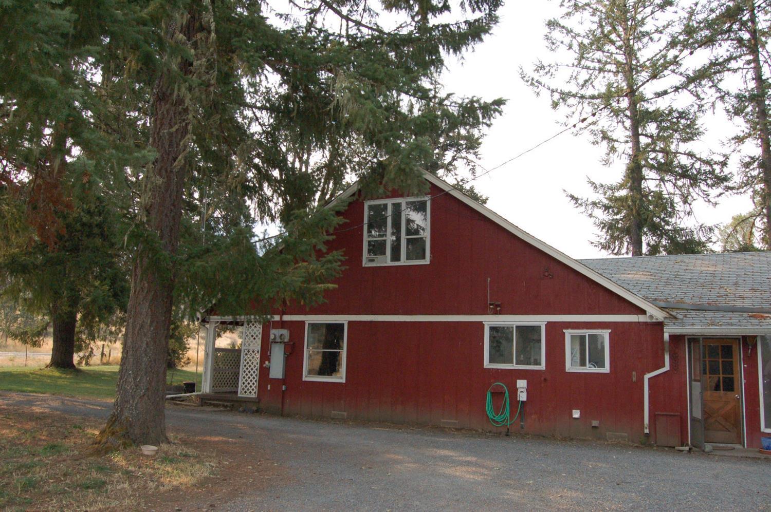 2180 Dick George Road Cave Junction, OR 97523 - Photo 5 of 34 Side view of home from the circular driv