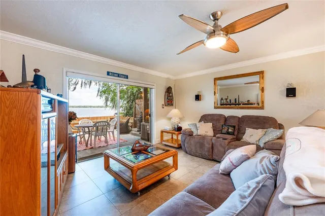 a view of a hallway with workspace and windows