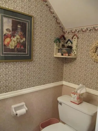 a en suite bathroom with sink and mirror