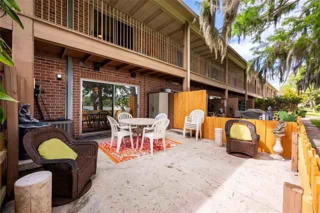 a view of balcony with wooden floor