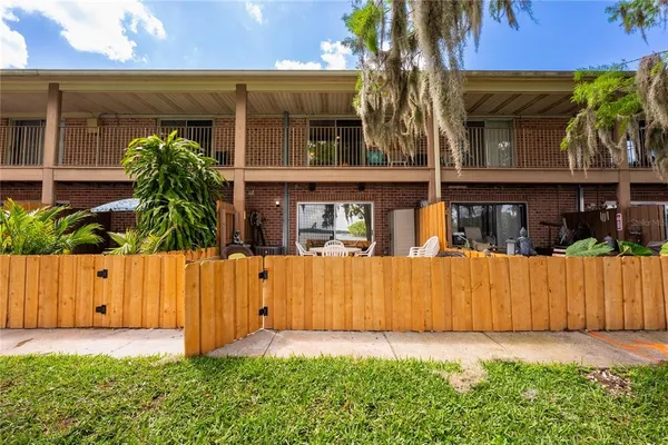 a view of yard with patio