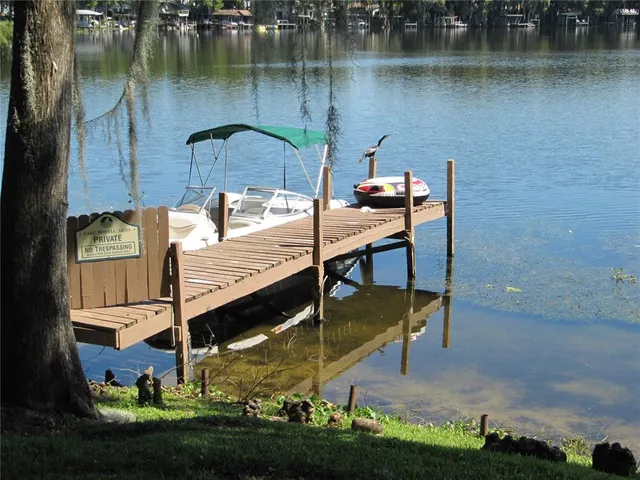 a view of a swimming pool with a lounge chair