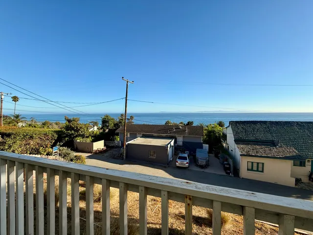 a view of a balcony with an outdoor space