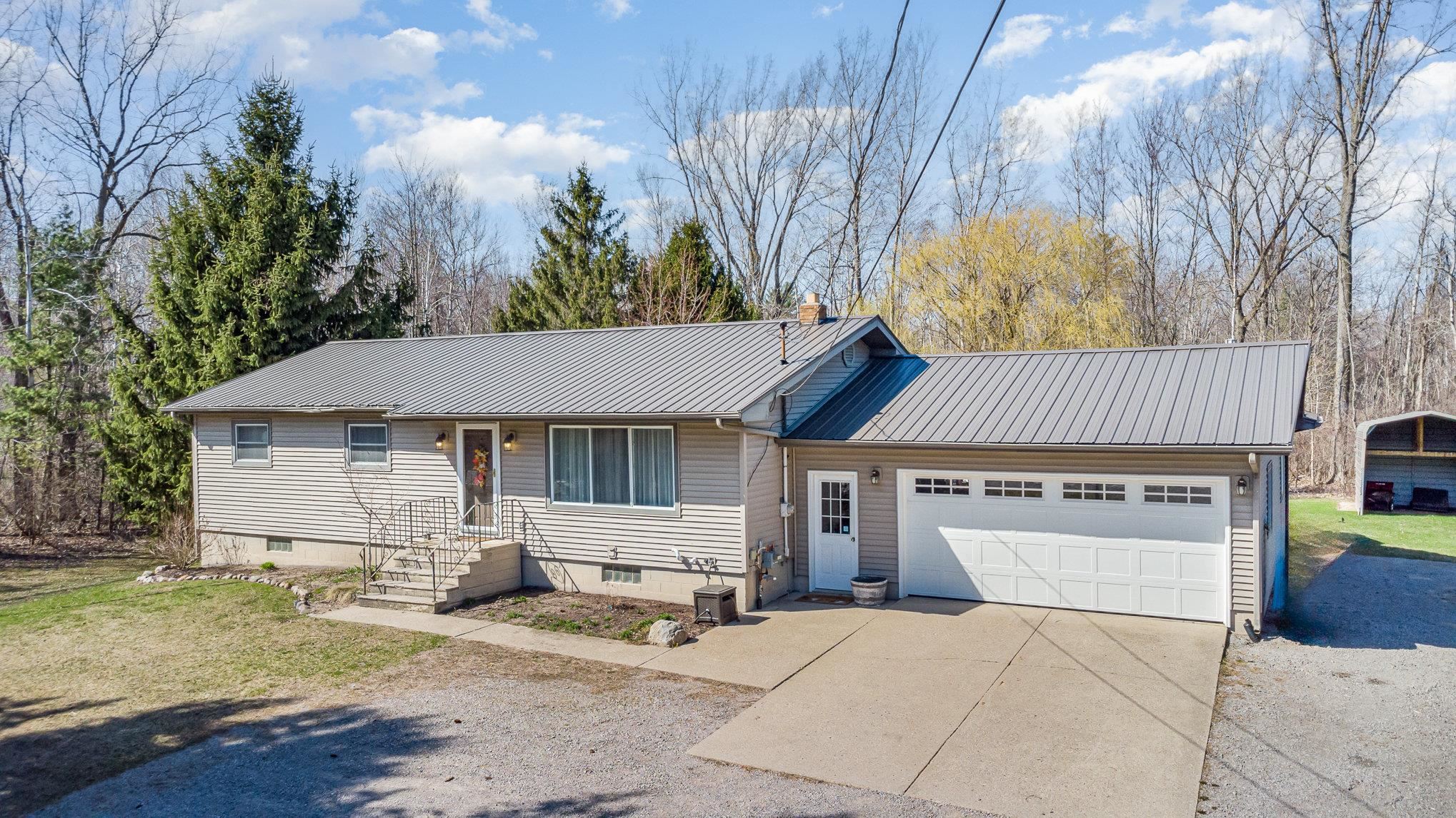 2341 East Cody Estey Road Pinconning, MI 48650 - Photo 1 of 22