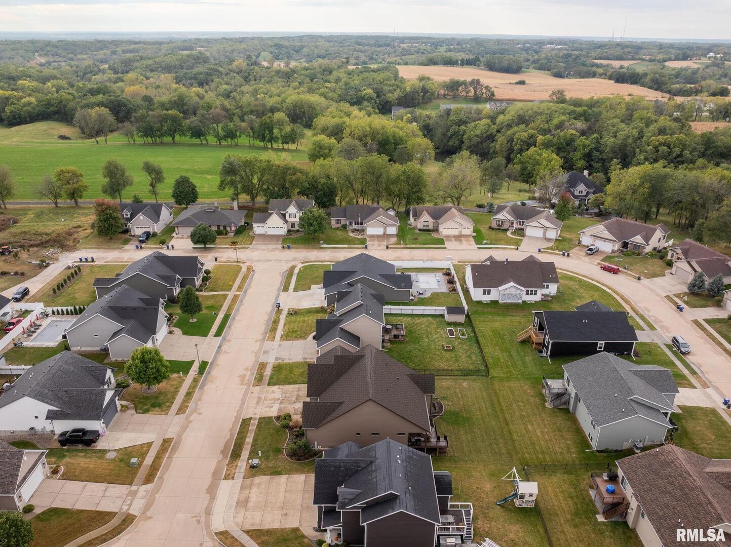 1422 Racine Court Davenport, IA 52804 - Photo 46 of 53 an aerial view of a city with lots of residential buildings