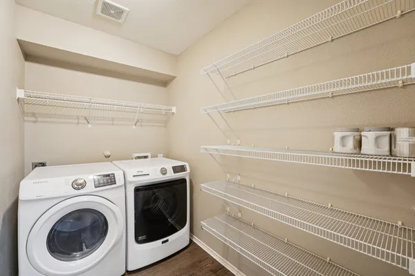 a utility room with dryer and washer