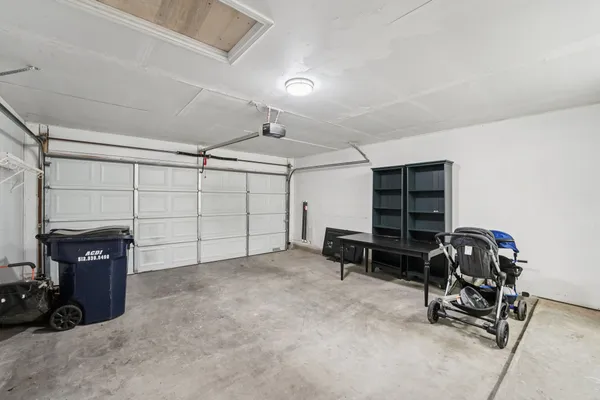 a view of a garage with furniture