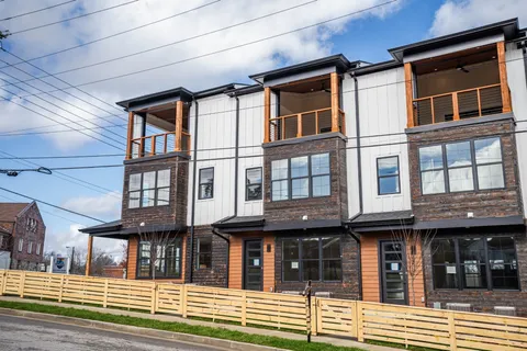 a front view of a house with a porch