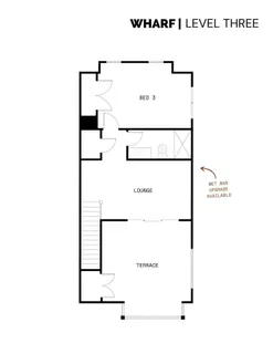 a front view of a building with a potted plant