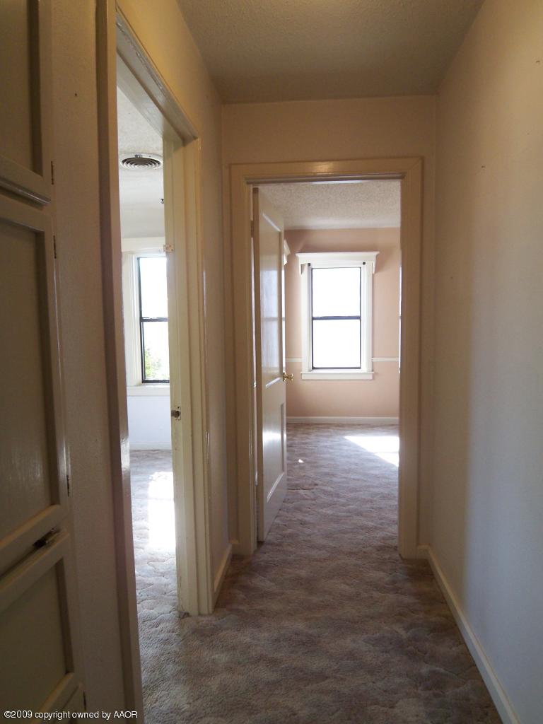 3814 Parker Street Amarillo, TX 79110 - Photo 8 of 13 a view of hallway with windows