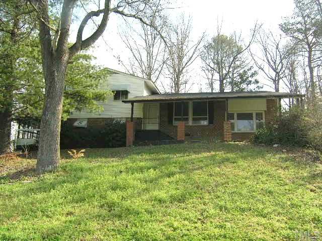 1913 Crawford Road Raleigh, NC 27610 - Photo 1 of 12 front view of a house with a yard