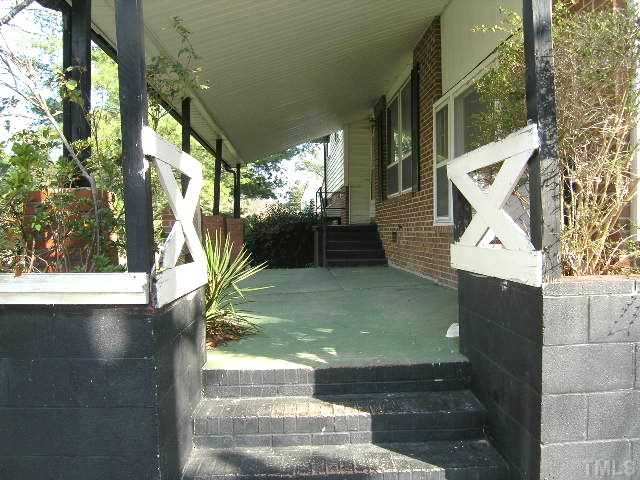 1913 Crawford Road Raleigh, NC 27610 - Photo 2 of 12 a view of yard from door