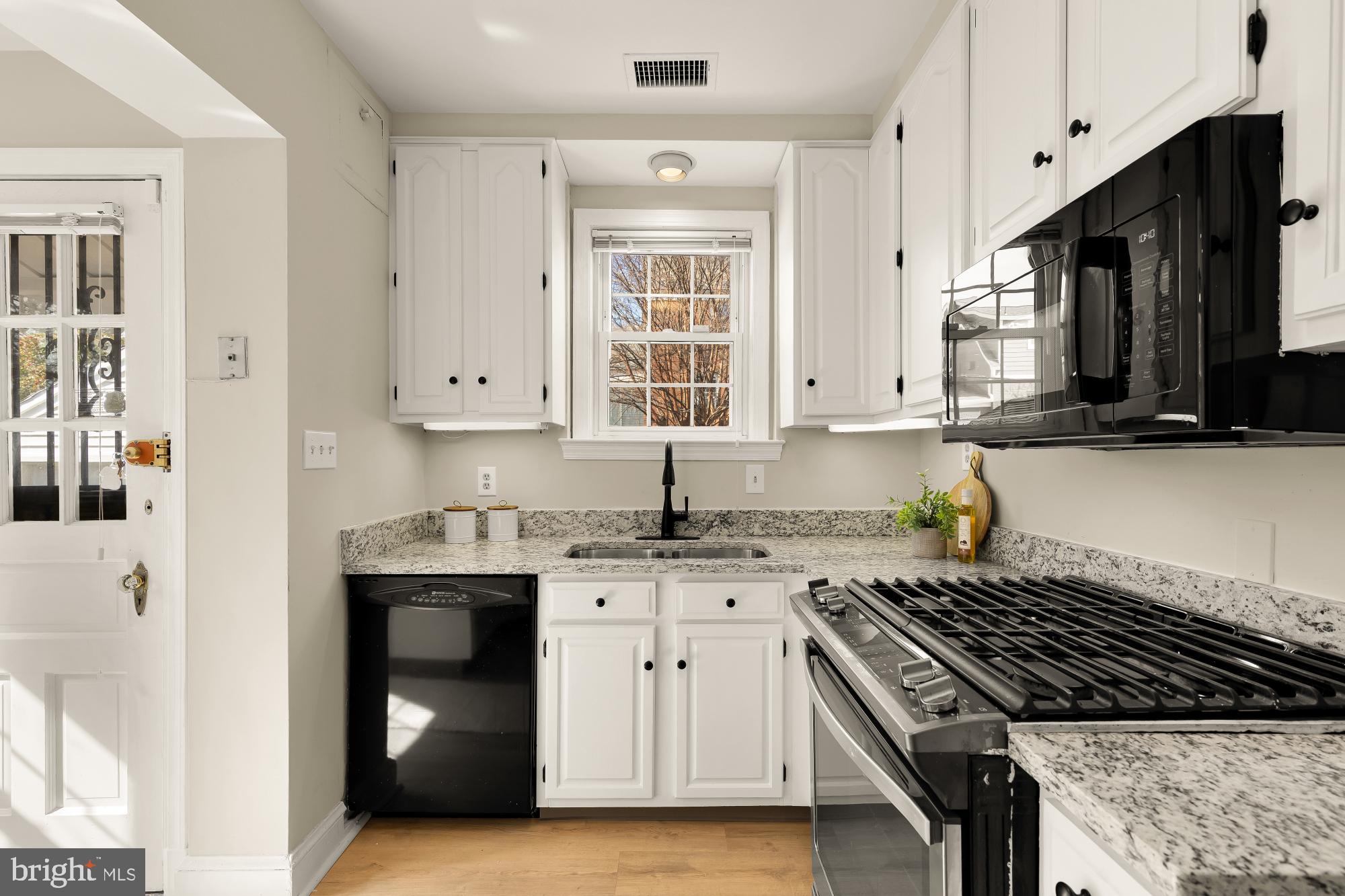3918 17th Place Northeast Washington, DC 20018 - Photo 16 of 57 Kitchen with new granite counters