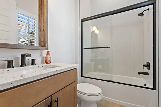 a view of a city with an ocean