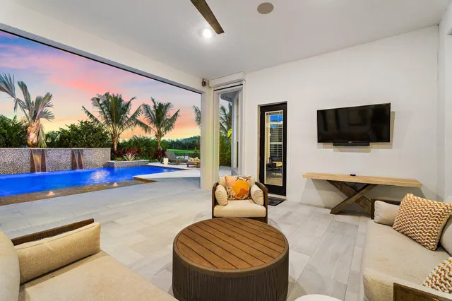 a utility room with a lot of stuff and cabinets